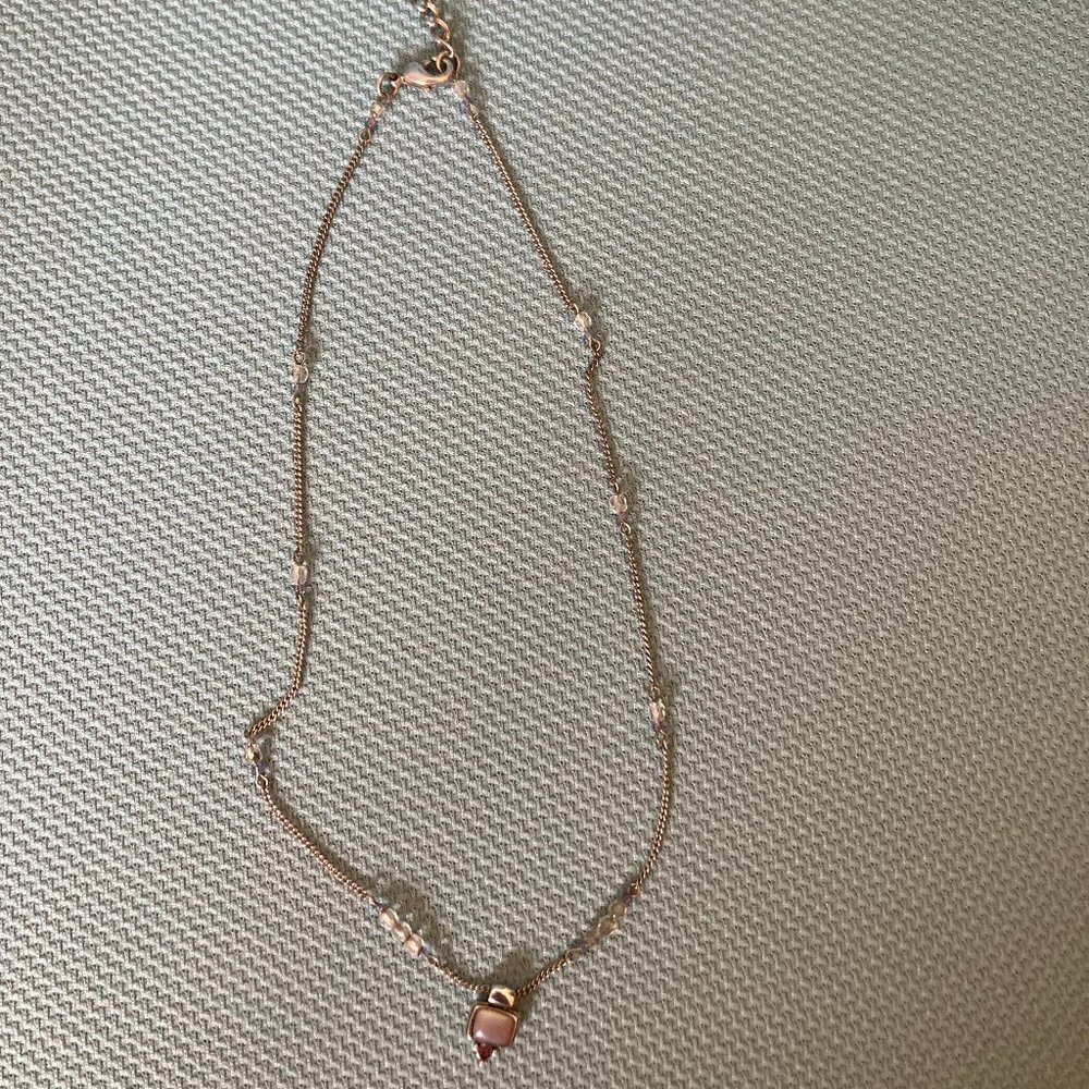 Amethyst stones in a silver necklace with beads